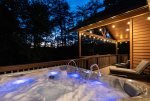 Hot tub on the main floor with beautiful lights for nighttime relaxation
